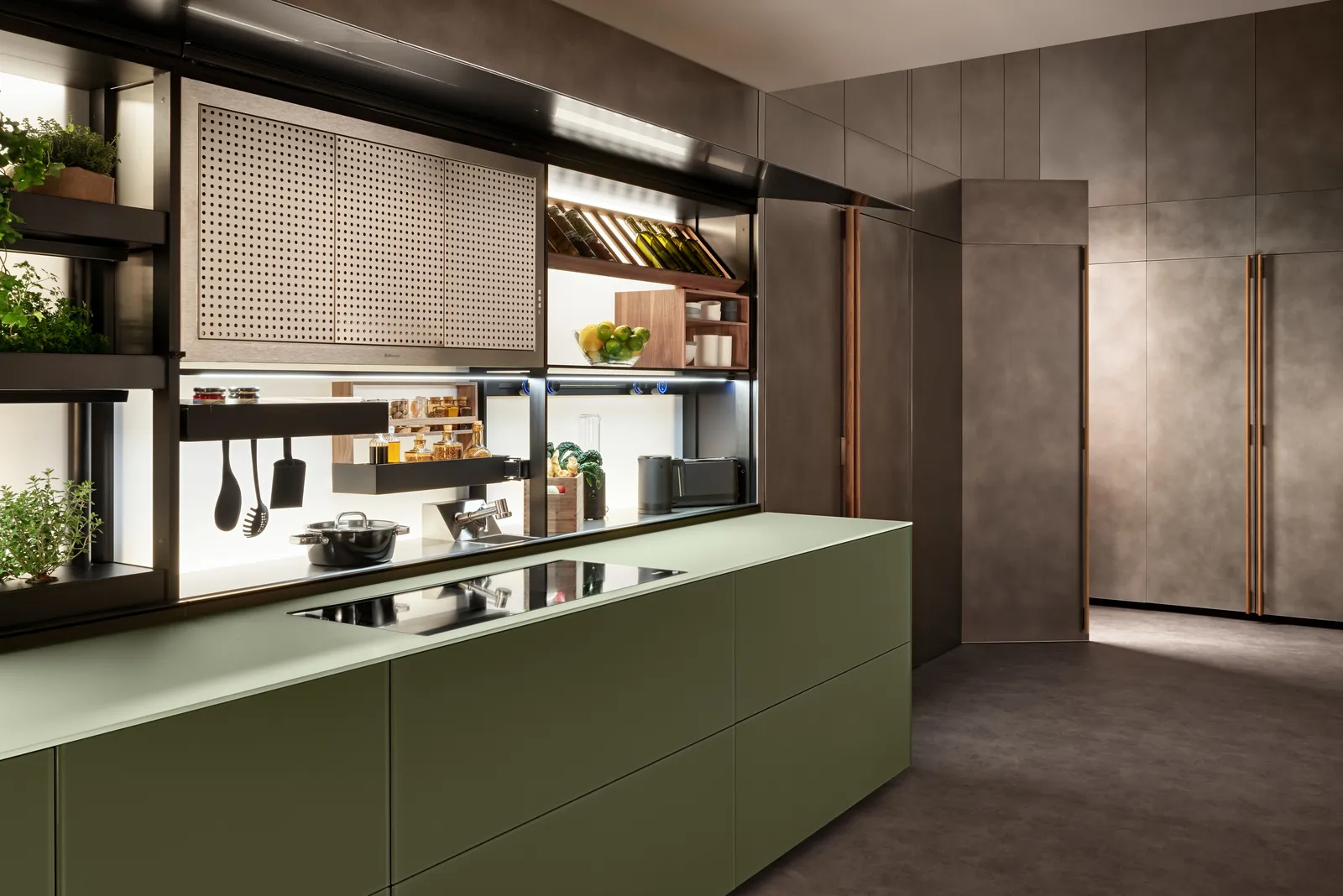 Moderne Küche in Salbeigrün matt mit Arbeitsplatte aus Mineralwerkstoff matt hellgrün von Valcucine